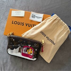 Louis Vuitton Monogram Canvas Clutch with Vivienne Design
